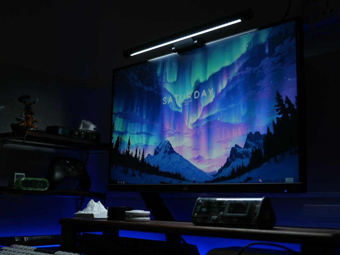 Modern video editing suite with multiple monitors showing a timeline and color grading scopes