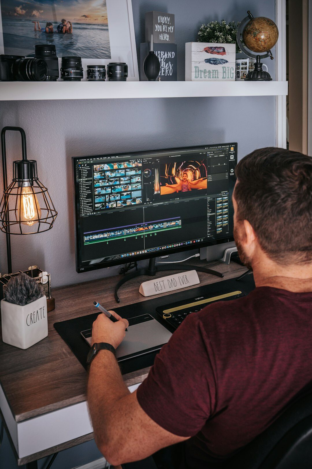 video editor working on computer